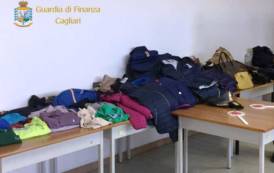 DOMUS DE MARIA, Sequestrati 113 accessori e capi di abbigliamento contraffatti: i due venditori riescono a fuggire 